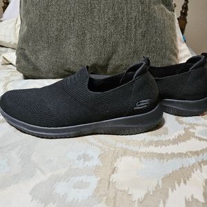 Skechers slip on shoes.